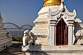 Myanmar - Sagaing, Shwe-kyet-kay a pagoda on a steep bank of the River close to the two parallel bridges linking Sagaing and Amarapura. 